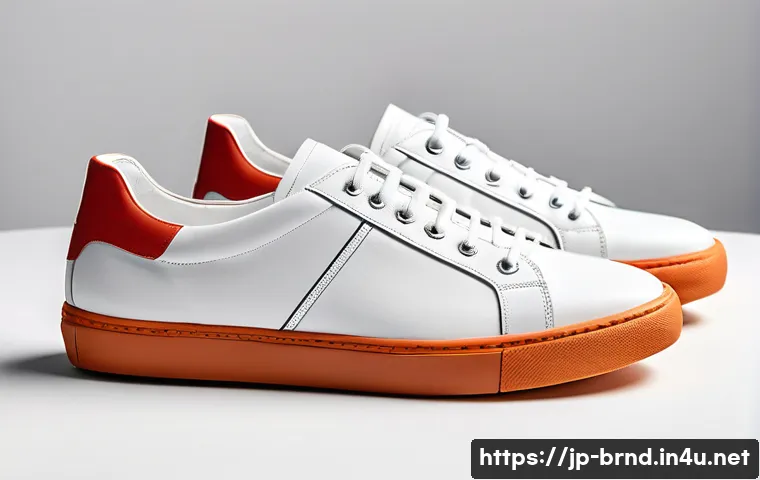 라코스테와 톰마틴의 가죽 스니커즈 - A pair of elegant leather sneakers displayed on a clean white background, showcasing a minimalist de...